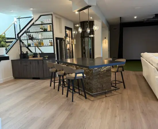 Lower level open floor plan with bar
